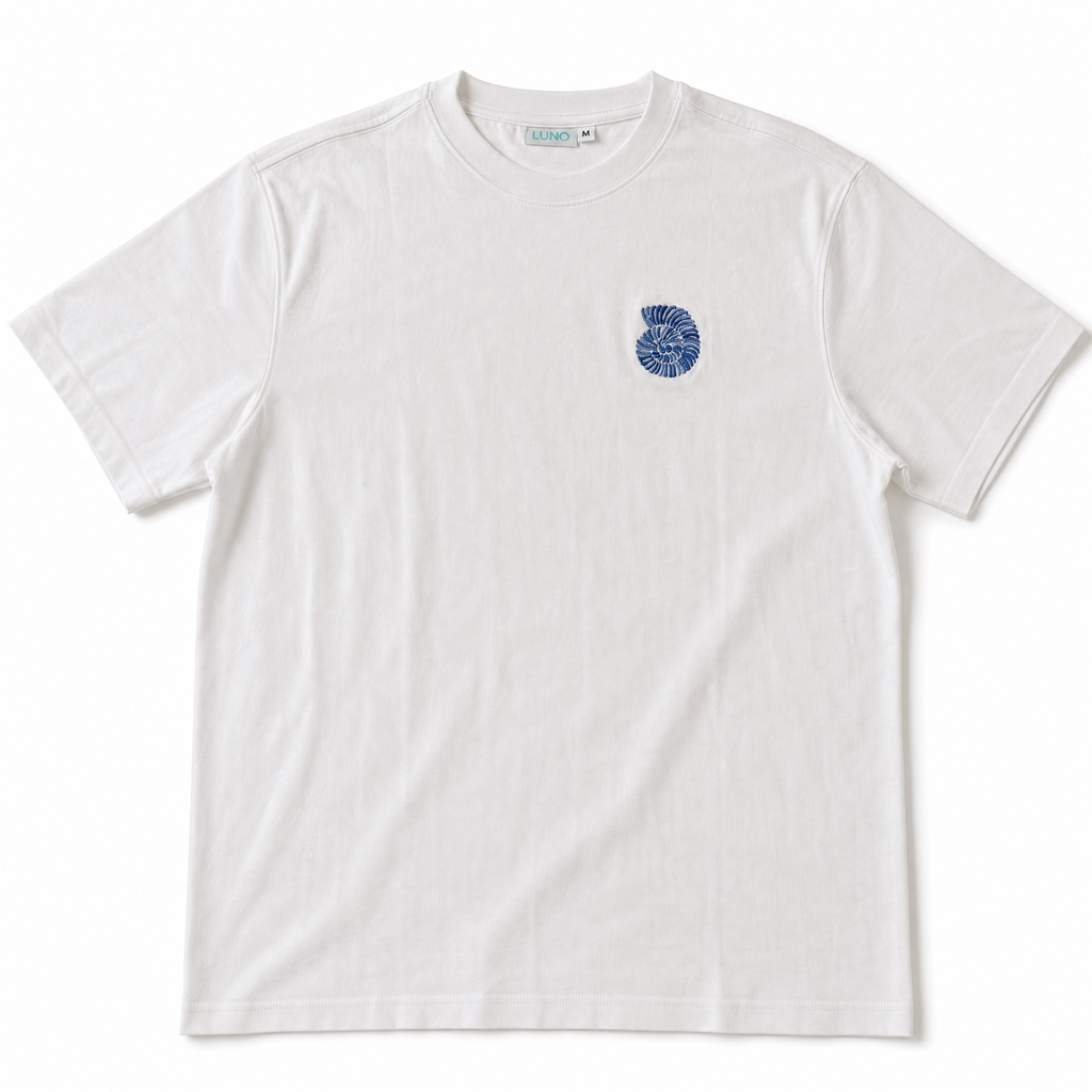 Cannes Tee front — navy ammonite embroidery