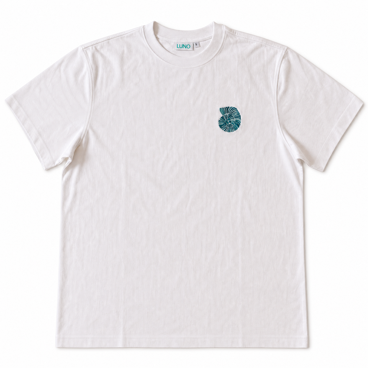 Surf Repeat Tee front — teal ammonite embroidery